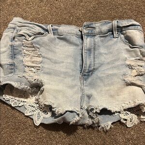 Distressed Light Blue Denim Shorts with Lace Trim